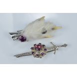 Two Scottish silver Ward Brothers brooches / kilt pins with purple glass gems, one hallmarked for Ed