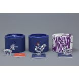 A group of three Swarovski crystal animal figurines to include a goat, a rooster and snail with boxe