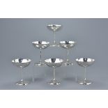 A set of six English Sterling silver champagne flutes