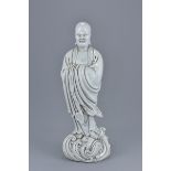 A Chinese 19/20th century Blanc de Chine figure of Damo with inscription of monastery name to revers