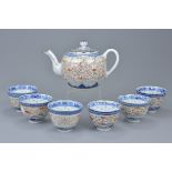 A set of six Chinese porcelain cups and teapot. (7)