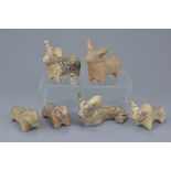 A group of six miniature painted pottery animal figures. Sizes approx. 9cm to 10cm length (6)