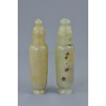 Two Chinese celadon and brown cylindrical pots with covers. With incised decoration . 13.5cm height