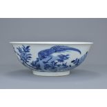 A Chinese 18th century blue and white porcelain bowl decorated with pheasant bearing six character m