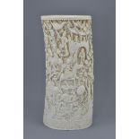 A quality large Chinese late Qing dynasty / Republic period ivory vase deeply carved with figures in