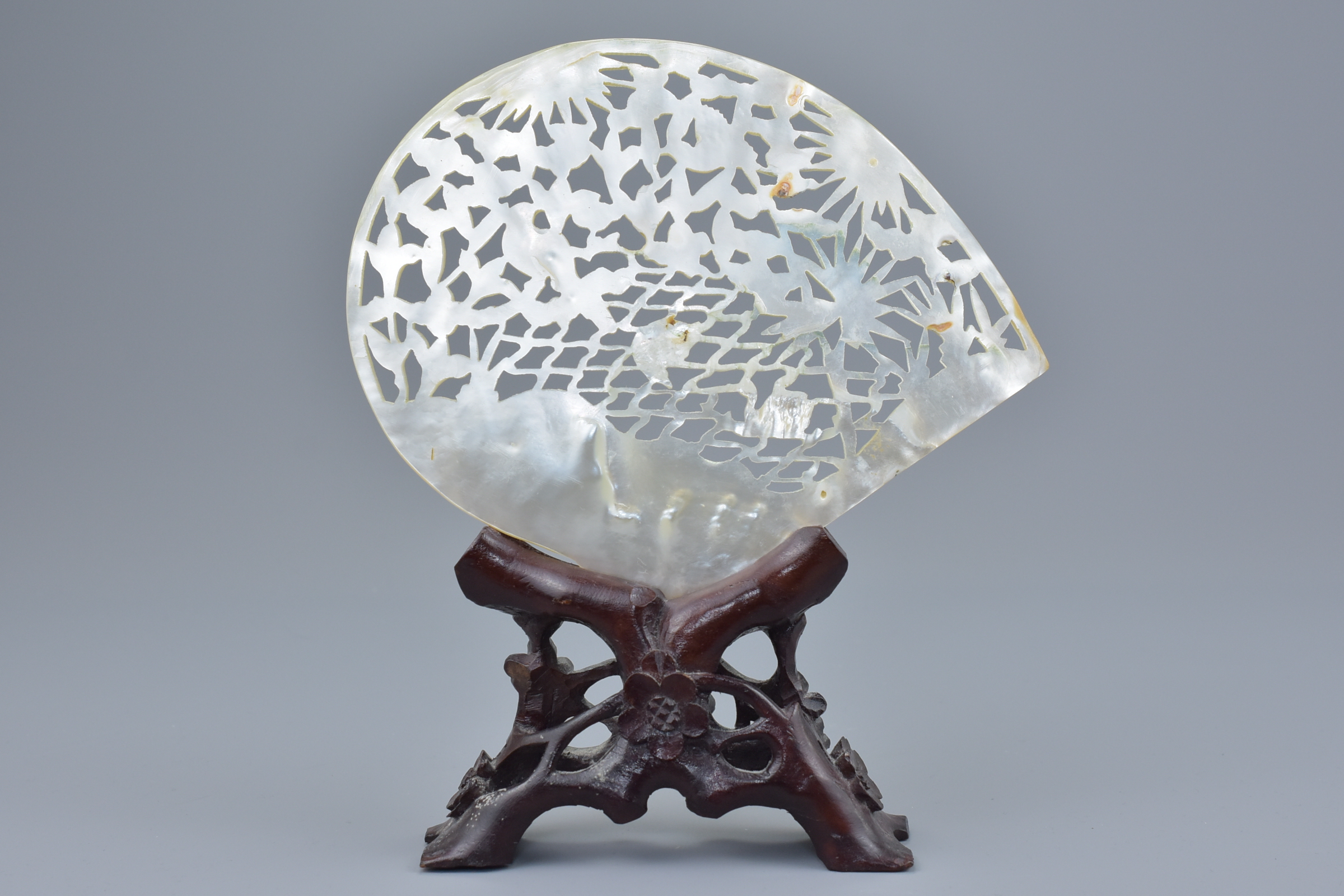 A Chinese vintage mother-of-pearl shell with pierced decoration depicting birds in tree on wooden st - Image 3 of 3