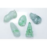 Five Chinese jadeite / jade pendants. A peanut, cabbage, corn, peach and animal. Approx. 4cm length