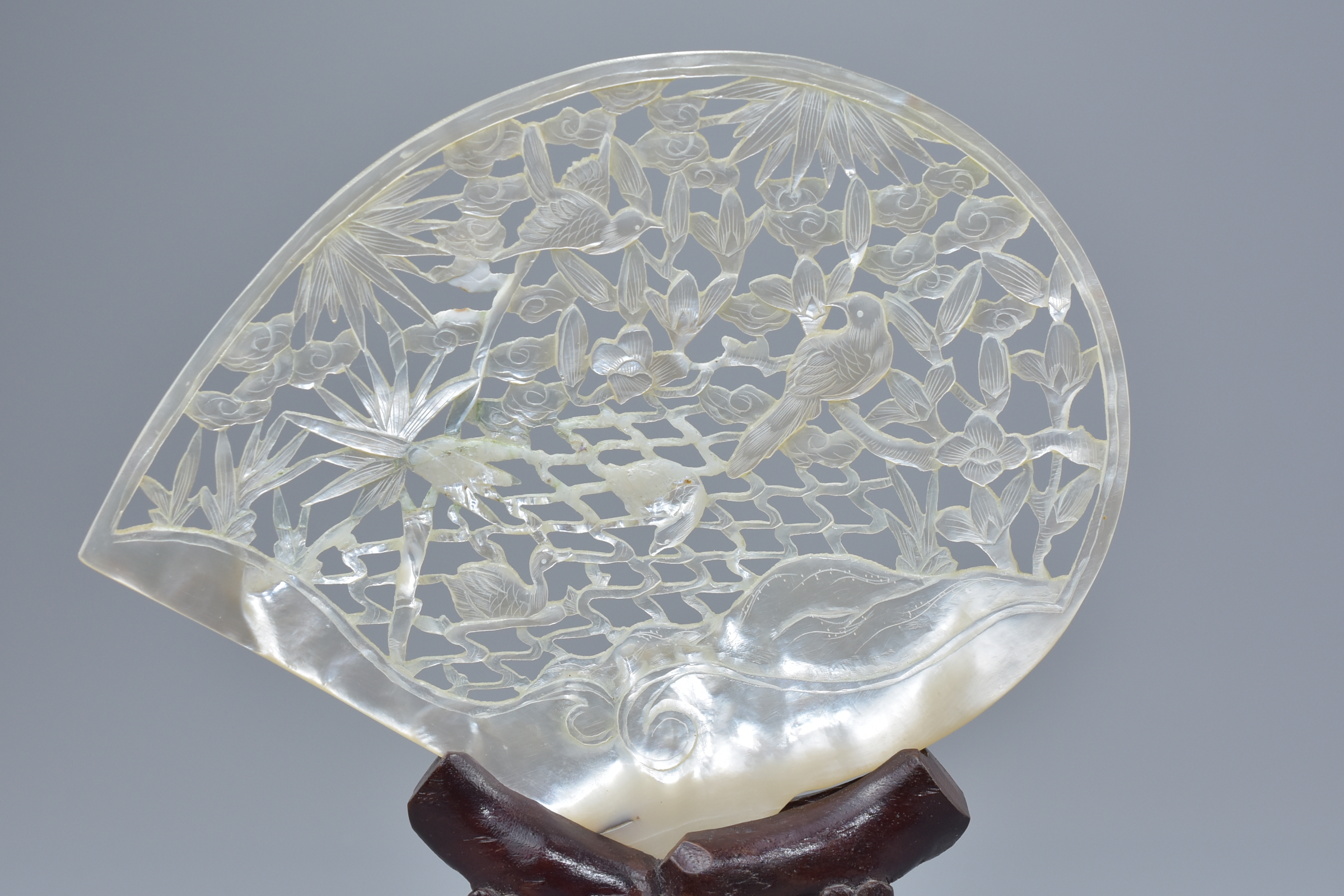 A Chinese vintage mother-of-pearl shell with pierced decoration depicting birds in tree on wooden st - Image 2 of 3