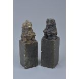 A pair of Chinese carved soapstone seals mounted with lions. Approx. 10.5cm height (2)