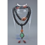 Chinese Zitan Wood with Agate Bead Necklace with Turquoise Pendant, approximately 70cms long