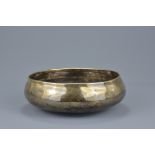 A quality 18/19th century Chinese hammered polished bronze / Bitong singing bowl. 18Cm width. Weight