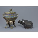 A Chinese archaic style bronze incense burner with cover on four legs together with a 19th century C