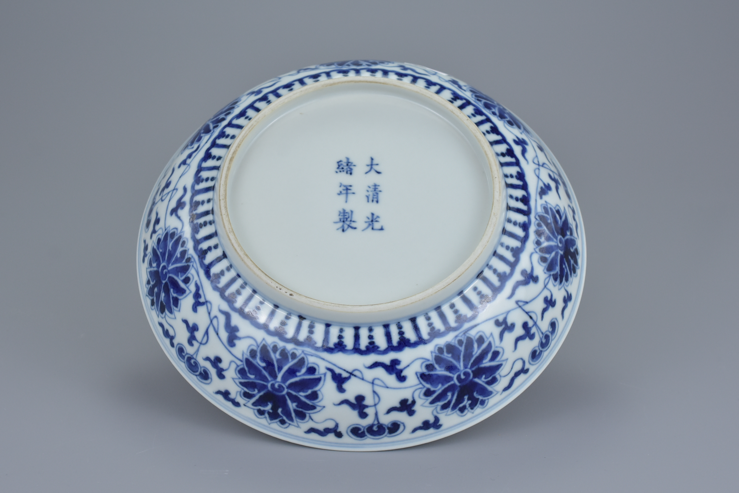 A Chinese late 19th century blue and white porcelain dish with floral lotus, chrysanthemum and peony - Image 3 of 6