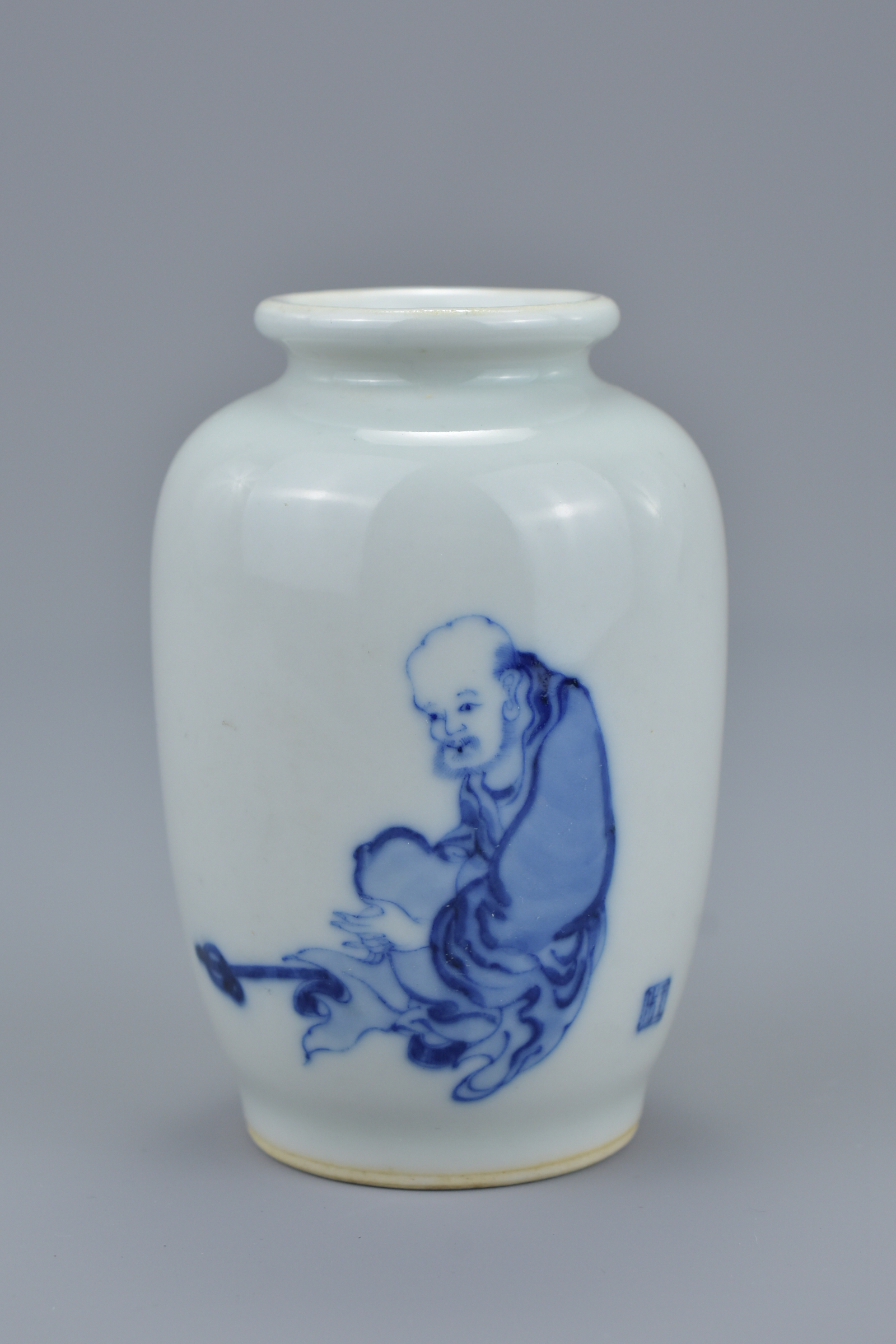 A small quality Chinese Republic period blue and white porcelain vase painted with single figure of