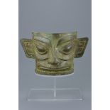 A Chinese Archaic Sanxingdui style bronze mask on Perspex display stand. 24Cm width