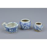 Two Chinese 18th century blue and white porcelain bird feeders and pot