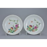 A pair of Chinese 18/19th Famille rose porcelain dishes with floral decoration. 15.5cm diam. (2)