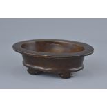 Chinese Bronze Oval Censer on four feet with personal Hall mark to base, 536 grams, 14cms long