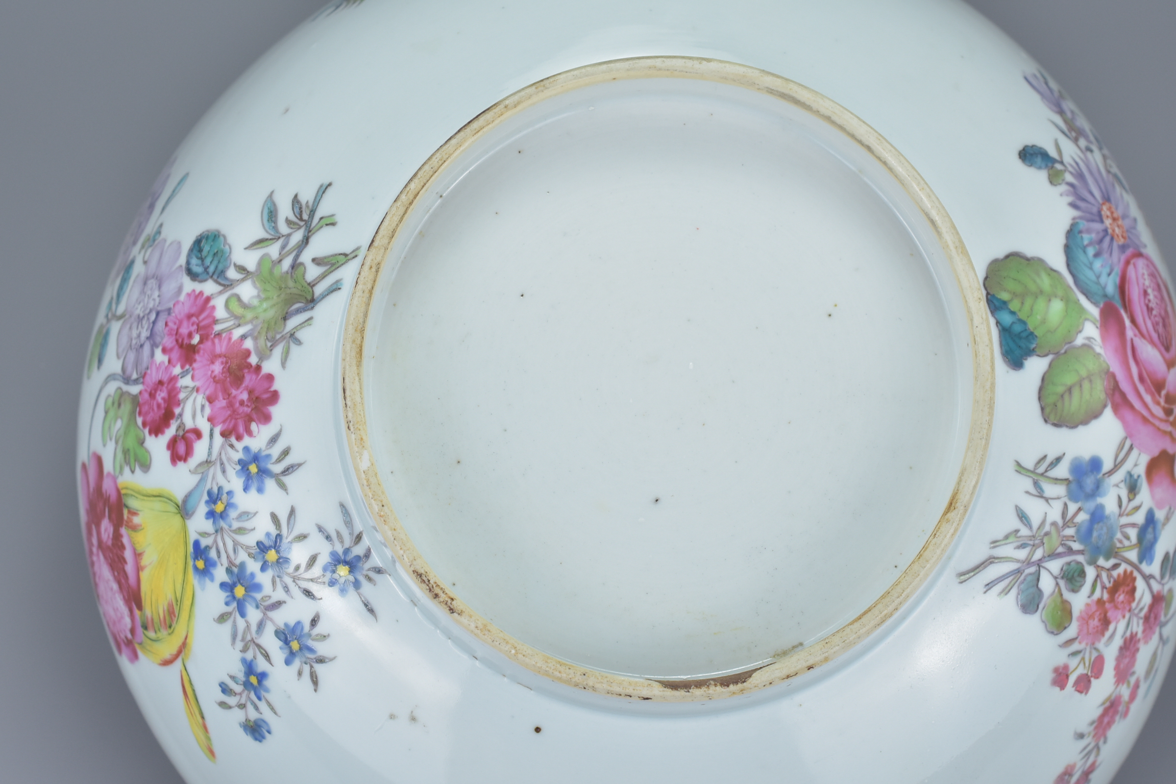 A large Chinese 18th century famille rose porcelain punch bowl decorated with various flowers and br - Image 7 of 8