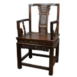 A Chinese Guangdong late 19th century hardwood armchair with pierced decoration of bats. Seat width