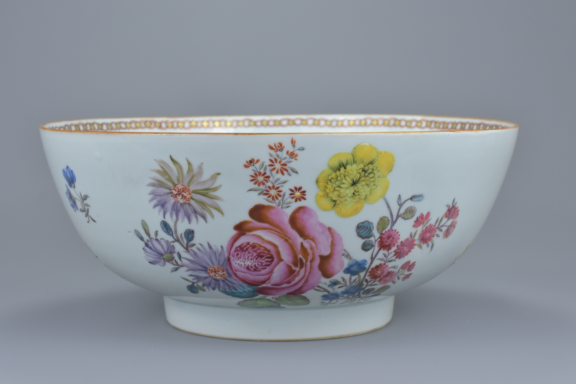 A large Chinese 18th century famille rose porcelain punch bowl decorated with various flowers and br - Image 3 of 8