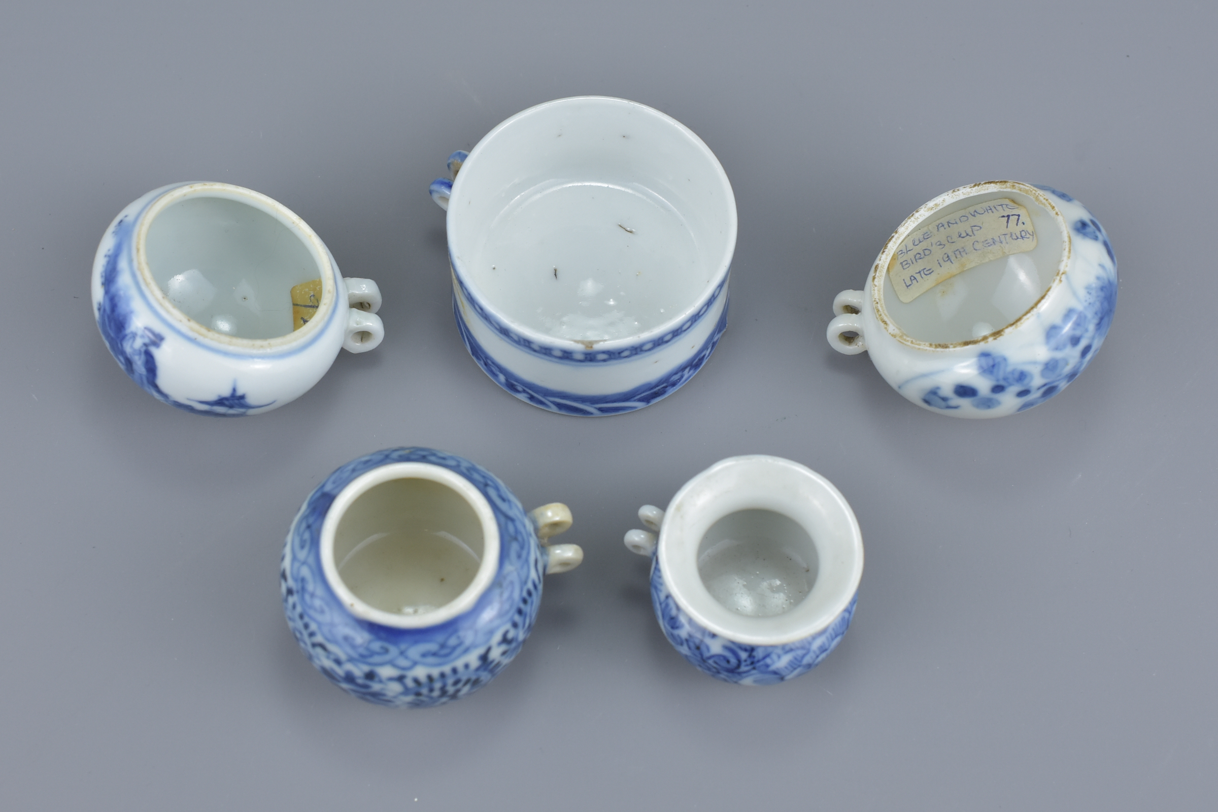 A group of five Chinese 19th Century blue and white porcelain bird feeders - Image 4 of 4