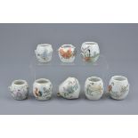 A group of eight Chinese 19/20th Century porcelain bird feeders