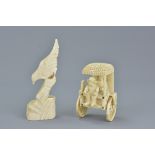 A 19/20th century Anglo-Indian carved ivory figure of a man in a carriage on wheels (af) together wi