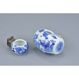 Two Chinese 19th Century blue and white porcelain bird feeders