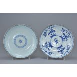 Two 18th century Chinese blue and white dishes one with brown glazed exterior painted with floral de