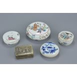 Three 19th century Chinese Famille Rose porcelain pots and covers together with a blue and white por