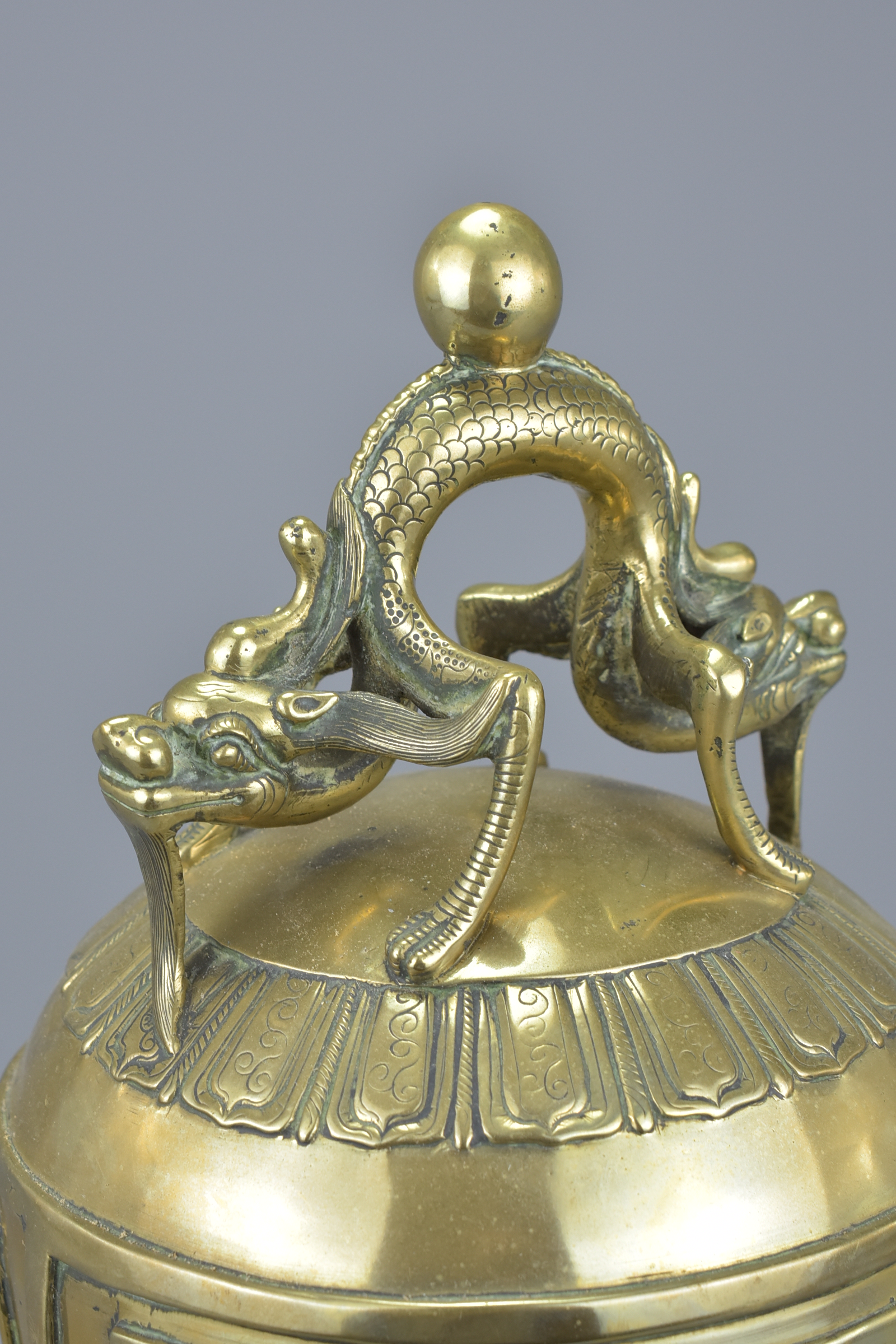 A large Chinese polished bronze bell gong mounted with a dragon handle. 33Cm tall - Image 5 of 6