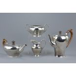 A rare English antique William IV four piece silve