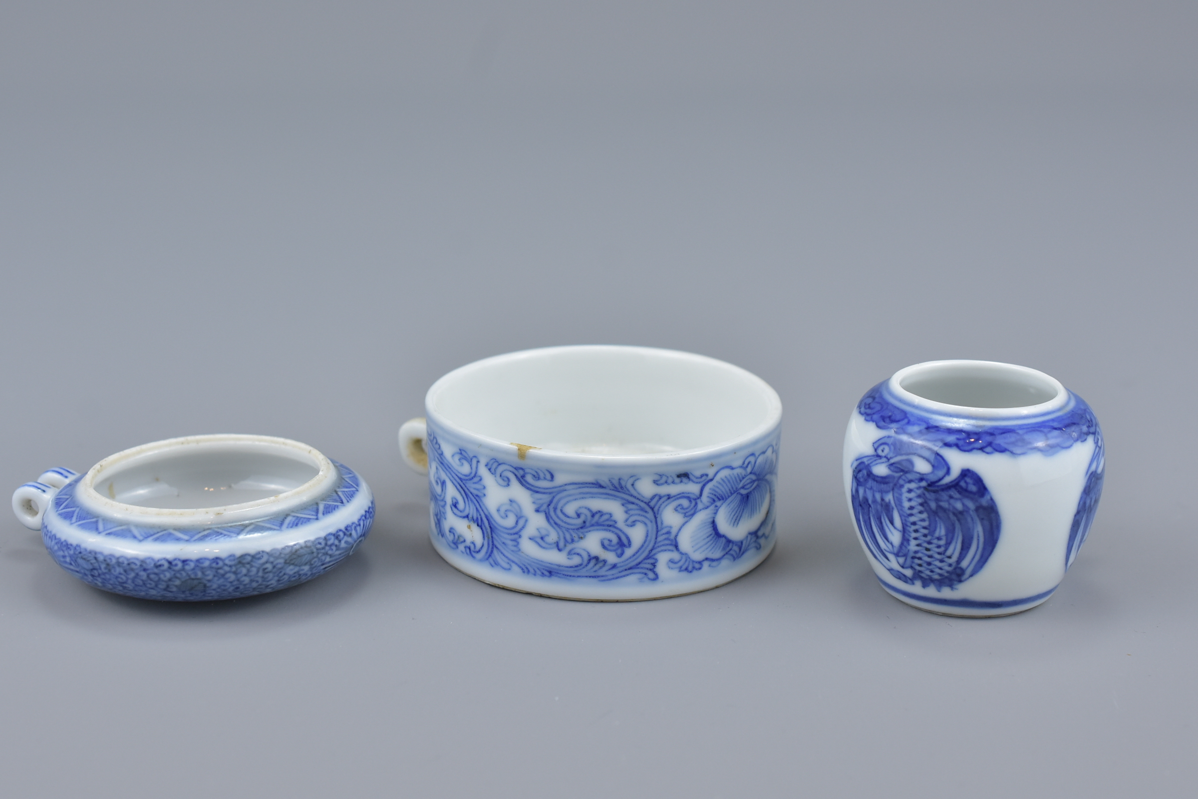 Three Chinese 19th Century blue and white porcelain bird feeders