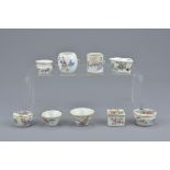 A group of nine Chinese 19/20th Century Famille Rose porcelain bird feeders and pots