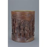 A Chinese 20th century carved bamboo brush pot with lady figures and inscription. 16cm tall