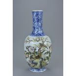 A Chinese Republic period famille rose porcelain vase with blue and white bottle neck decorated with