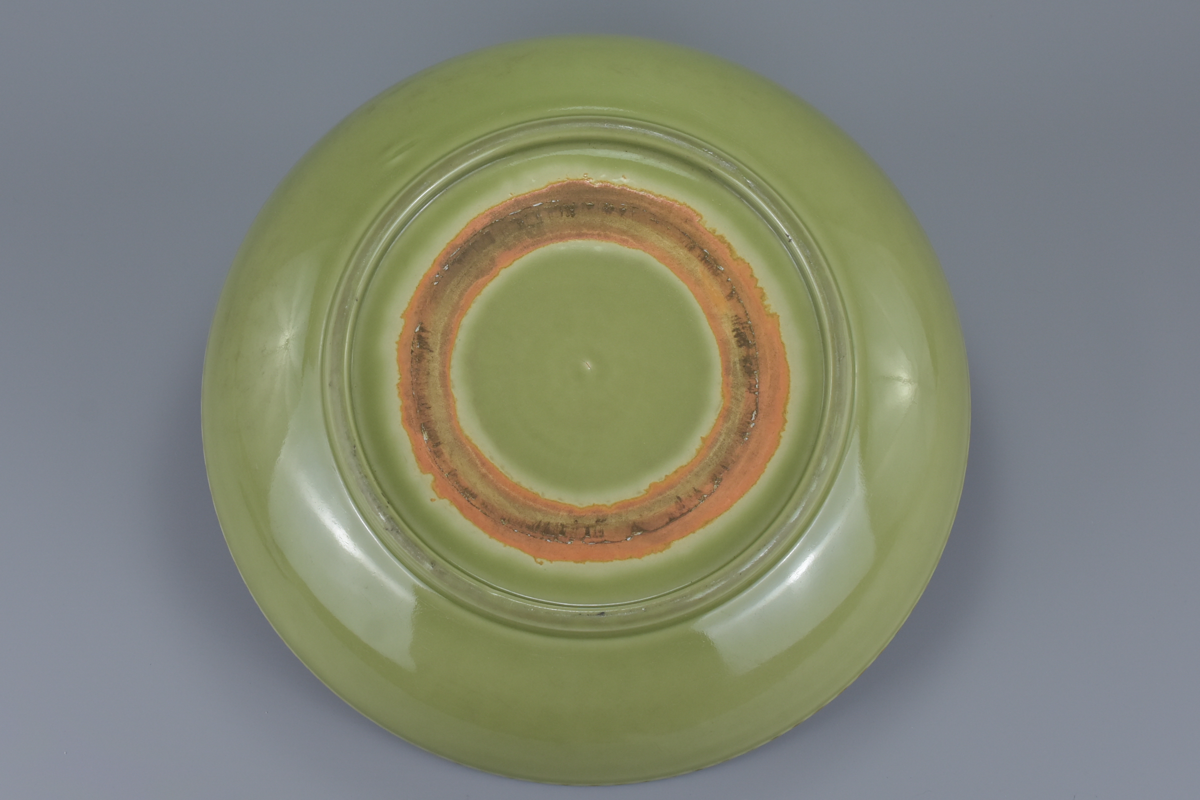 A large Chinese Ming dynasty or later celadon porcelain dish. 38cm diameter - Image 4 of 6