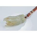 A Chinese pale greenish white jade carving of a 'Buddha's hand' citron. 7.5cm length