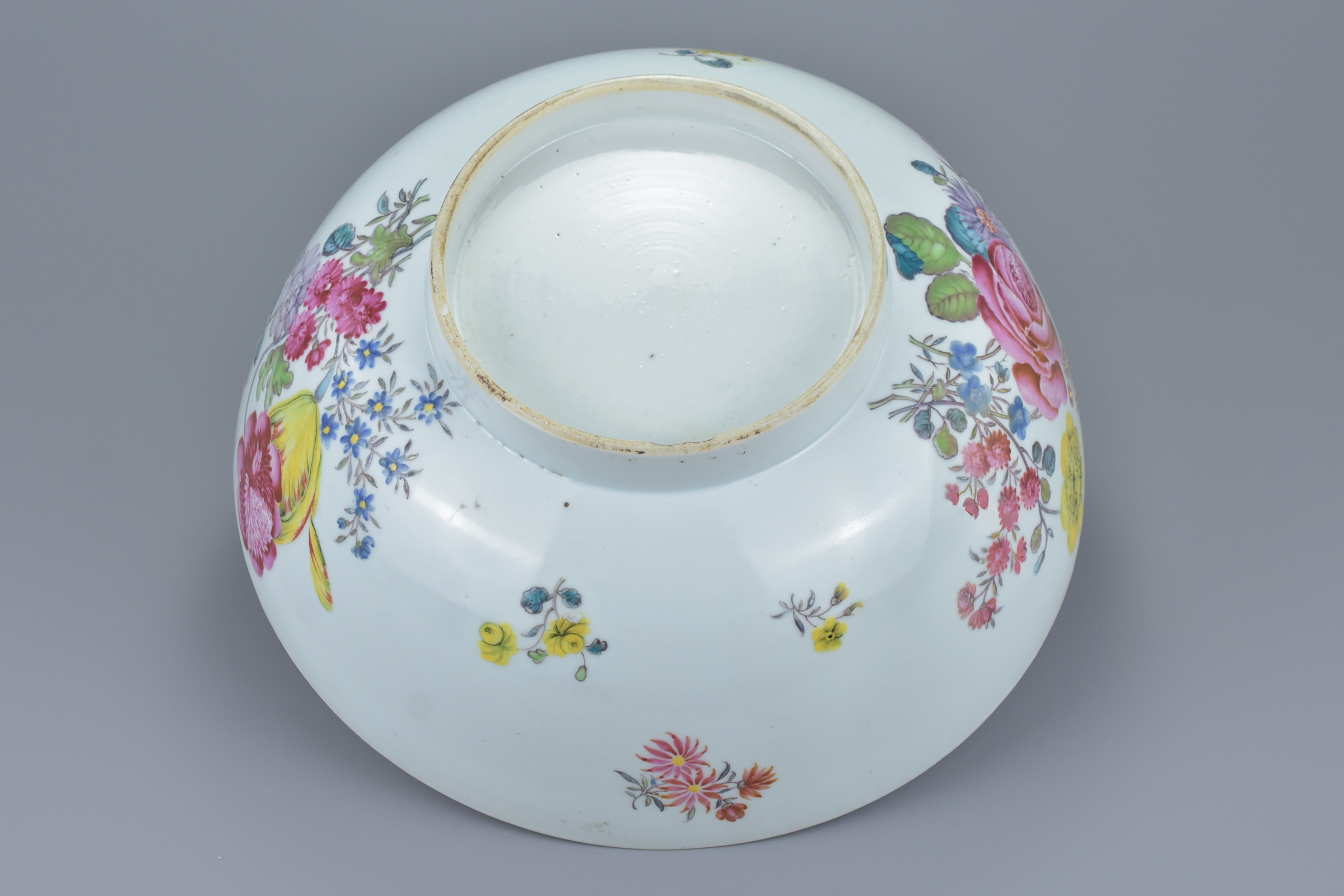 A large Chinese 18th century famille rose porcelain punch bowl decorated with various flowers and br - Image 6 of 8