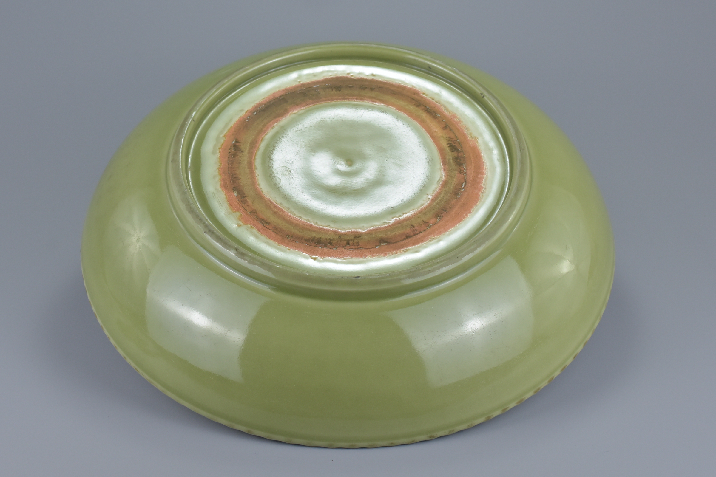 A large Chinese Ming dynasty or later celadon porcelain dish. 38cm diameter - Image 3 of 6