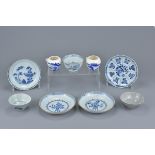A group of 19th Century Chinese porcelain items. To include four blue and white porcelain saucers on