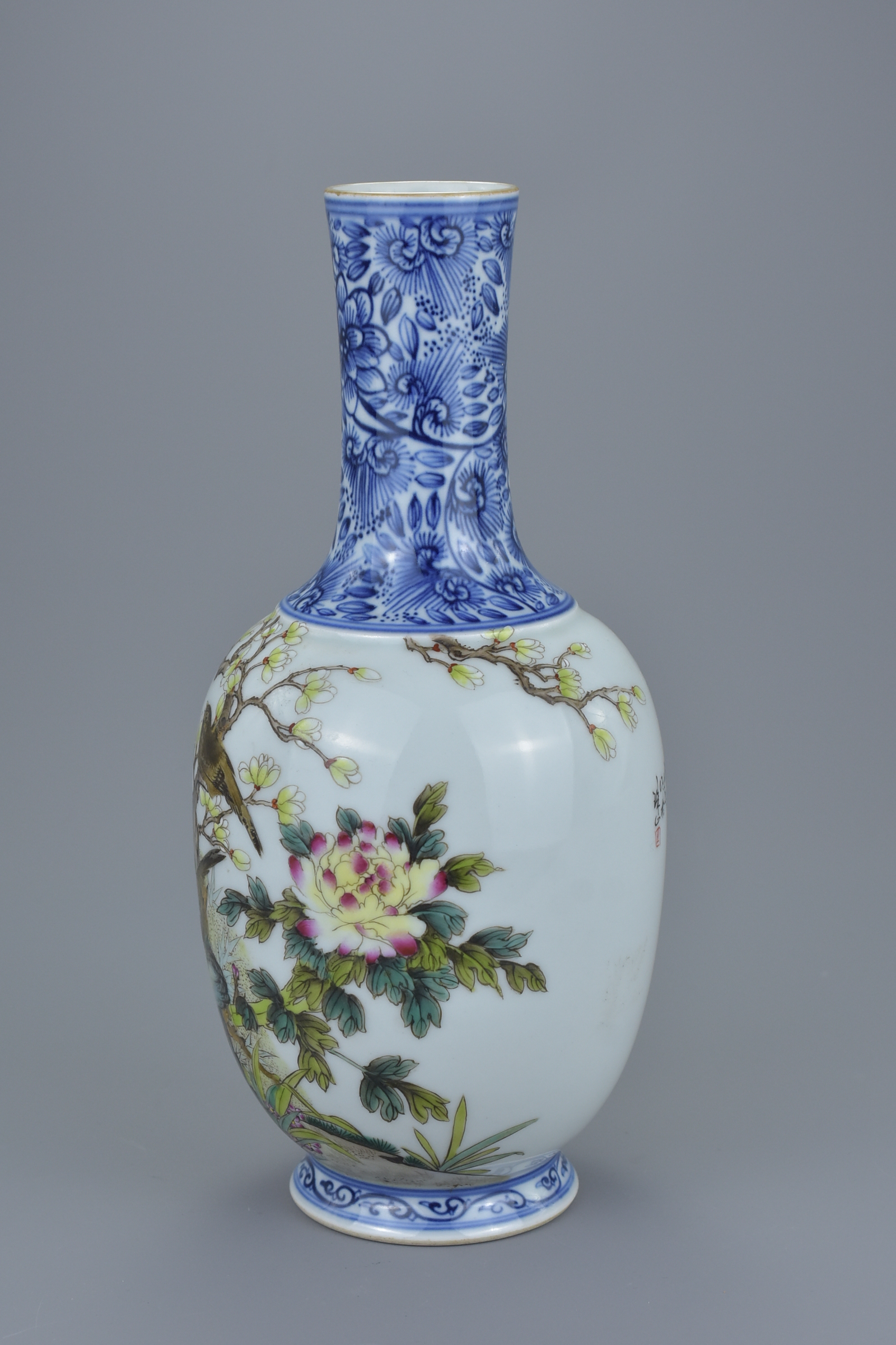 A Chinese Republic period famille rose porcelain vase with blue and white bottle neck decorated with - Image 2 of 6