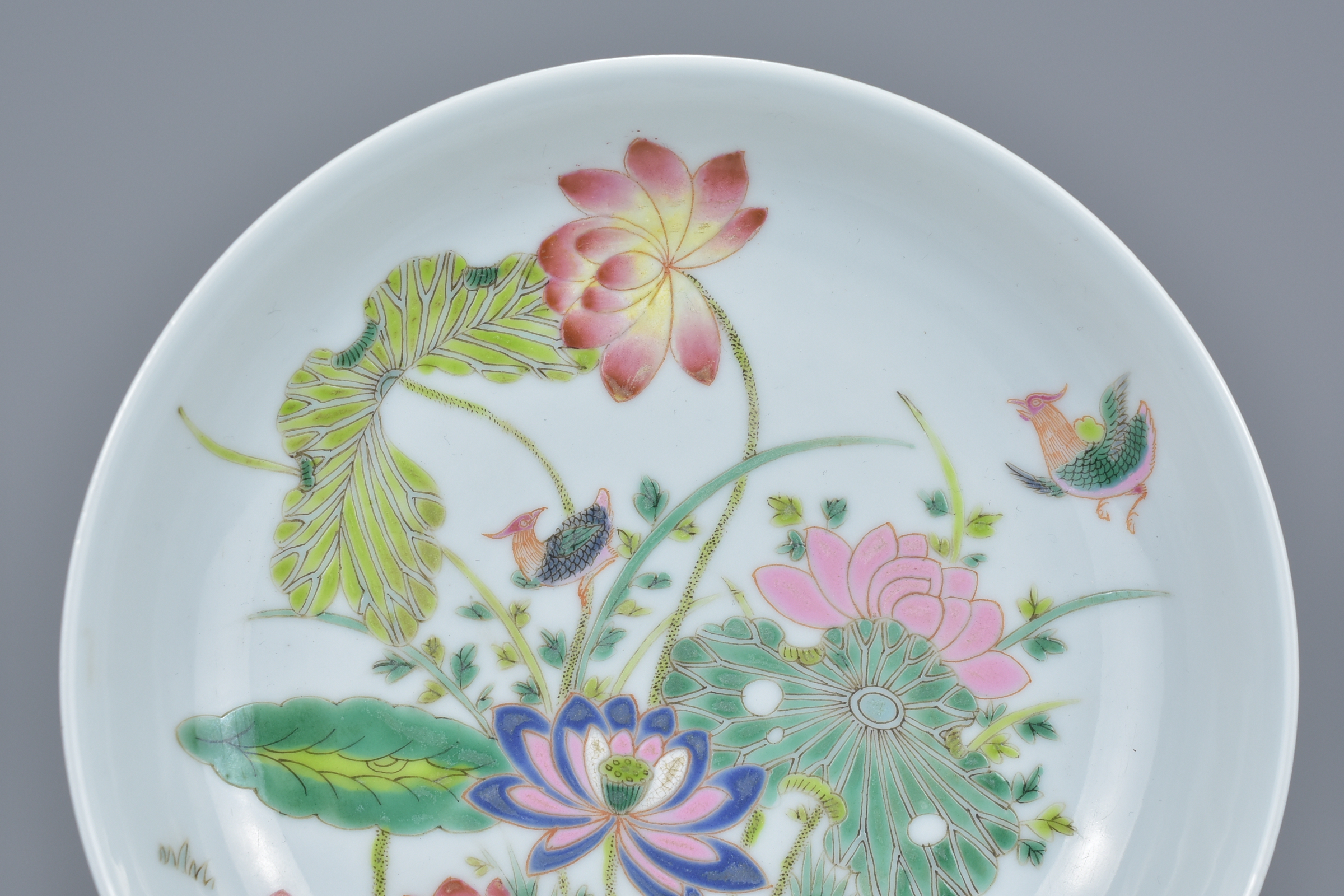 A Chinese 19/20th century Famille rose porcelain dish with florals and bird design. Six-character ma - Image 2 of 7