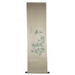 A Chinese watercolour painting on paper in scroll with wooden handles of a bird on a branch with one