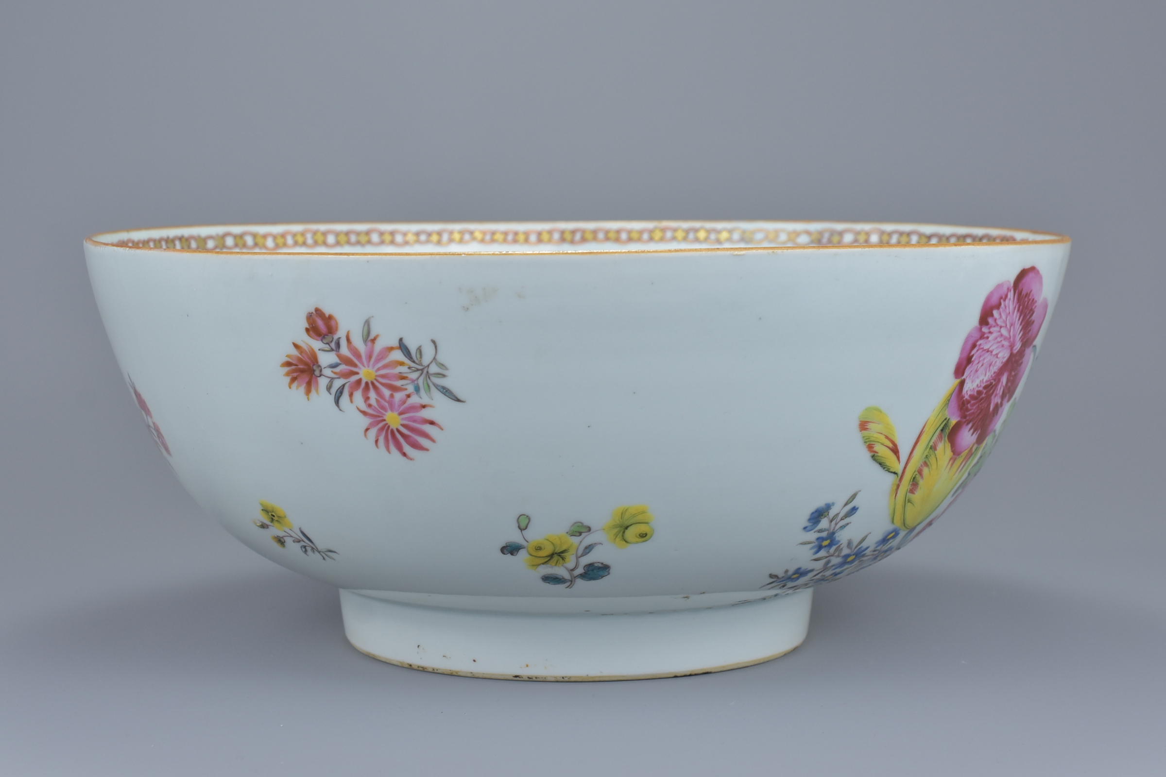 A large Chinese 18th century famille rose porcelain punch bowl decorated with various flowers and br - Image 4 of 8