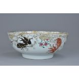 A large Chinese 18th century famille rose porcelain punch bowl decorated with gold fish to the inter