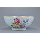 A large Chinese 18th century famille rose porcelain punch bowl decorated with various flowers and br