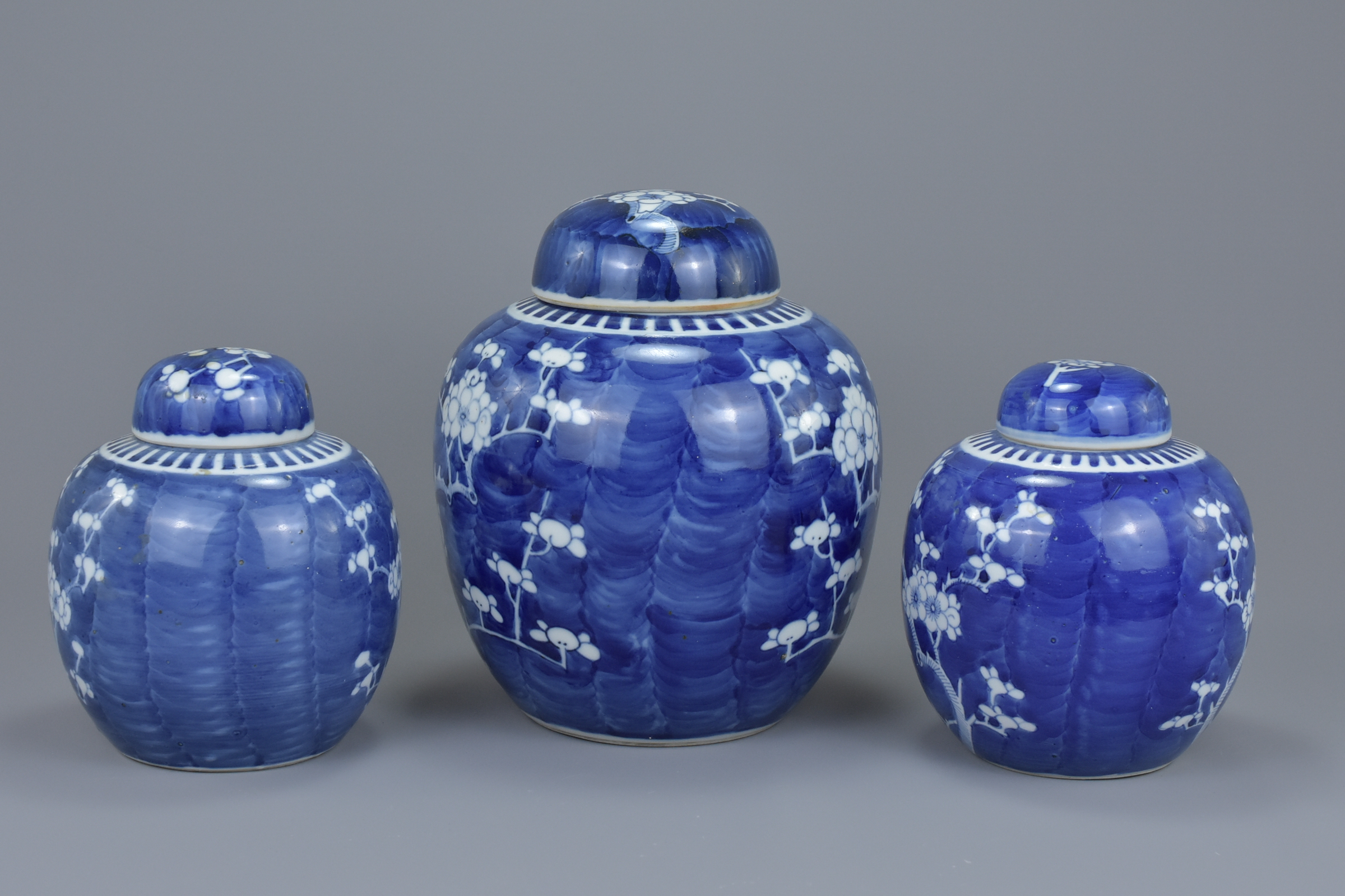 Three Chinese 19th century blue and white porcelain prunus ginger jars with covers. 16Cm to 21cm tal - Image 2 of 5