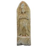 A Chinese Grey Stone Carving of a Guanyin Figure